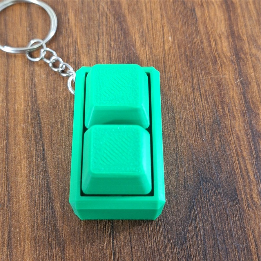 קליקר 2 קוביות ירוק עם מחזיק מפתחות